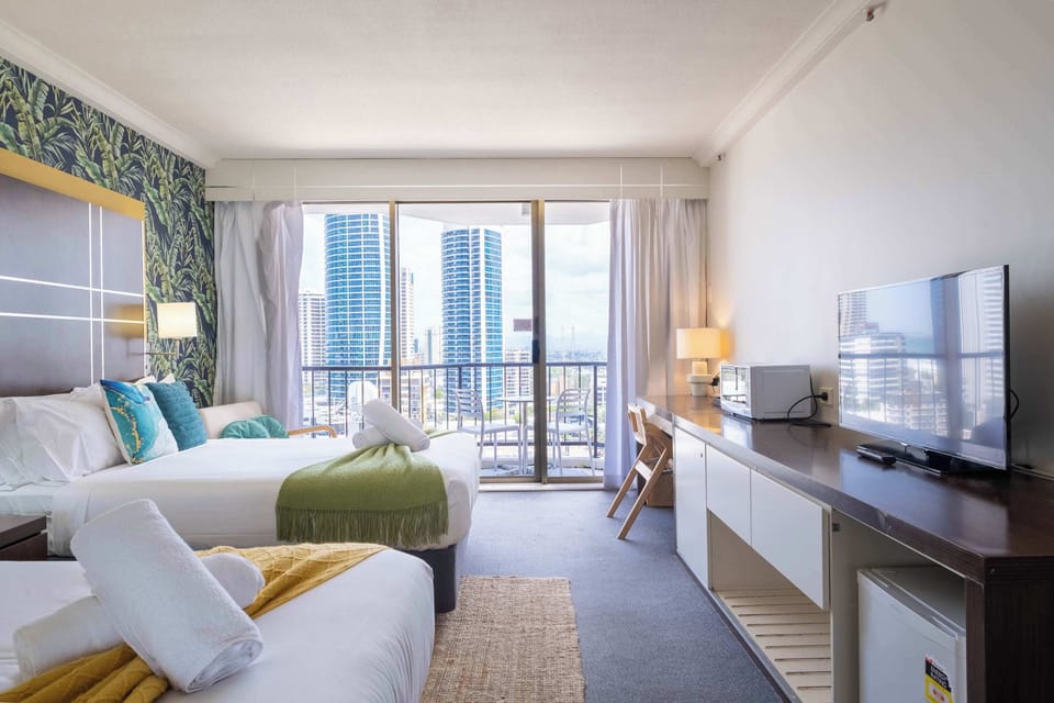  Wake up to breathtaking city and ocean views from your bed.