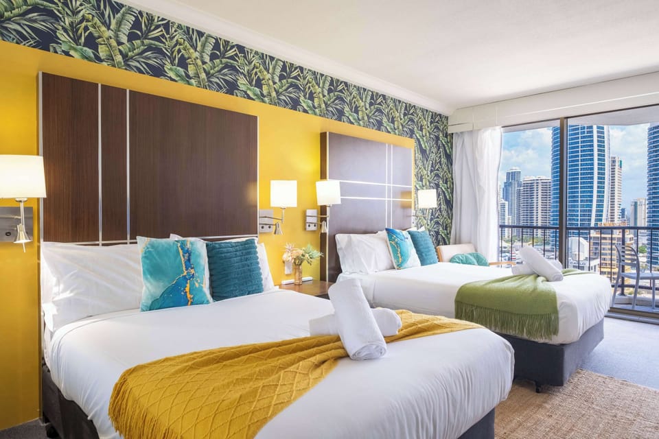  Wake up to breathtaking city and ocean views from your private balcony