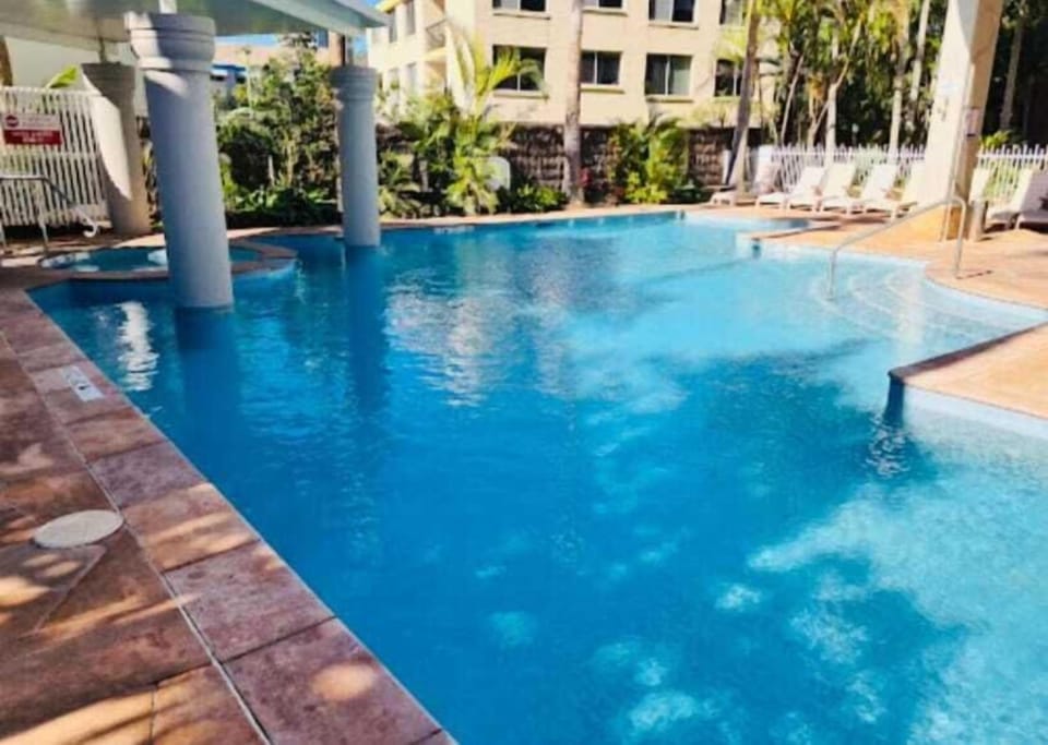 Sparkling pool with easy access and plenty of space to unwind