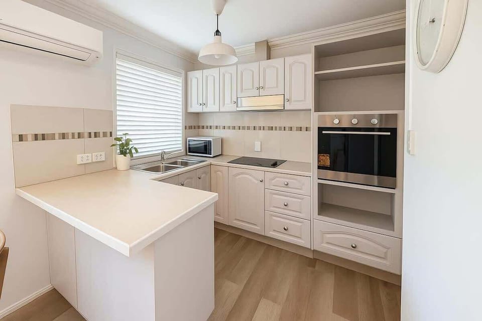Fully equipped kitchen with modern appliances