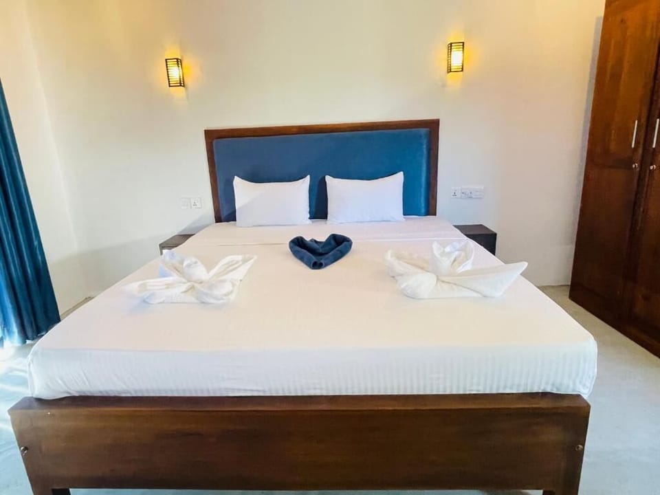 Deluxe Double Room, Balcony, Garden View | Laptop workspace, free WiFi
