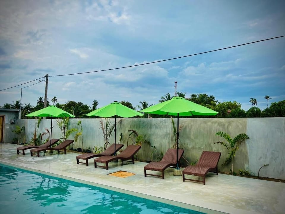 Deluxe Double Room, Balcony, Garden View | Pool | Outdoor pool