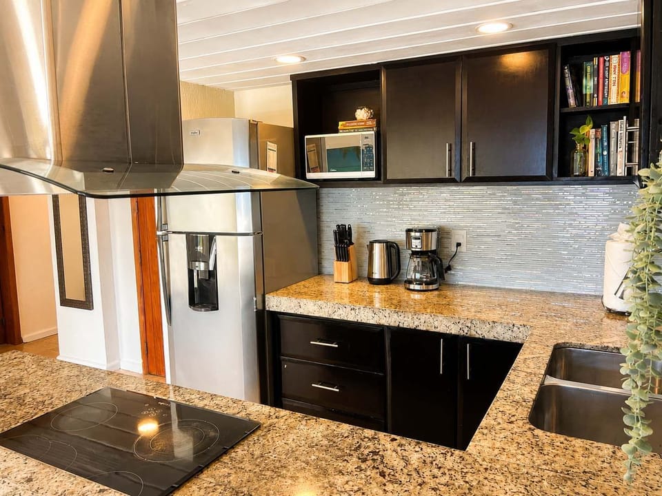 Fully equipped kitchen with modern appliances for easy meals at home