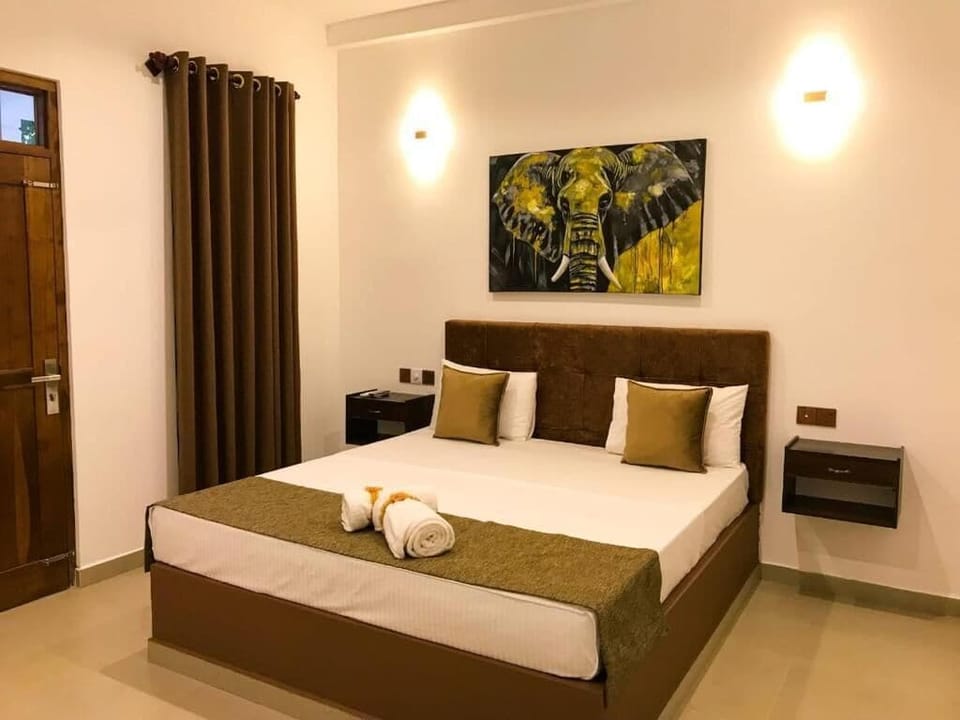 Deluxe Double Room, Balcony, Garden View | Laptop workspace, free WiFi