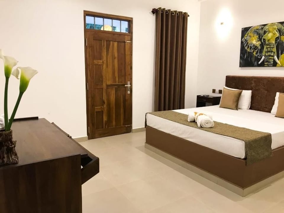Deluxe Double Room, Balcony, Garden View | Laptop workspace, free WiFi