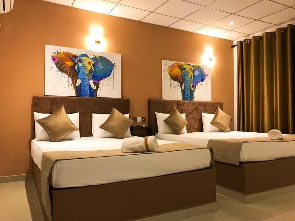 Deluxe Double Room, Balcony, Garden View | Laptop workspace, free WiFi