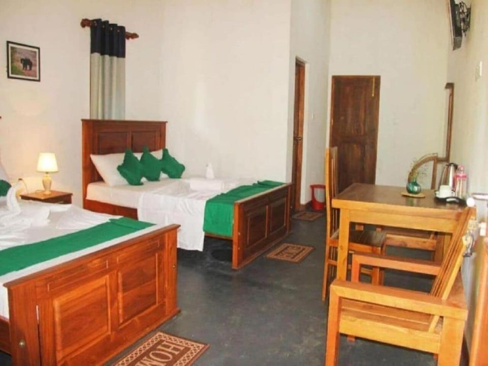 Deluxe Double Room, Garden View | Laptop workspace, free WiFi