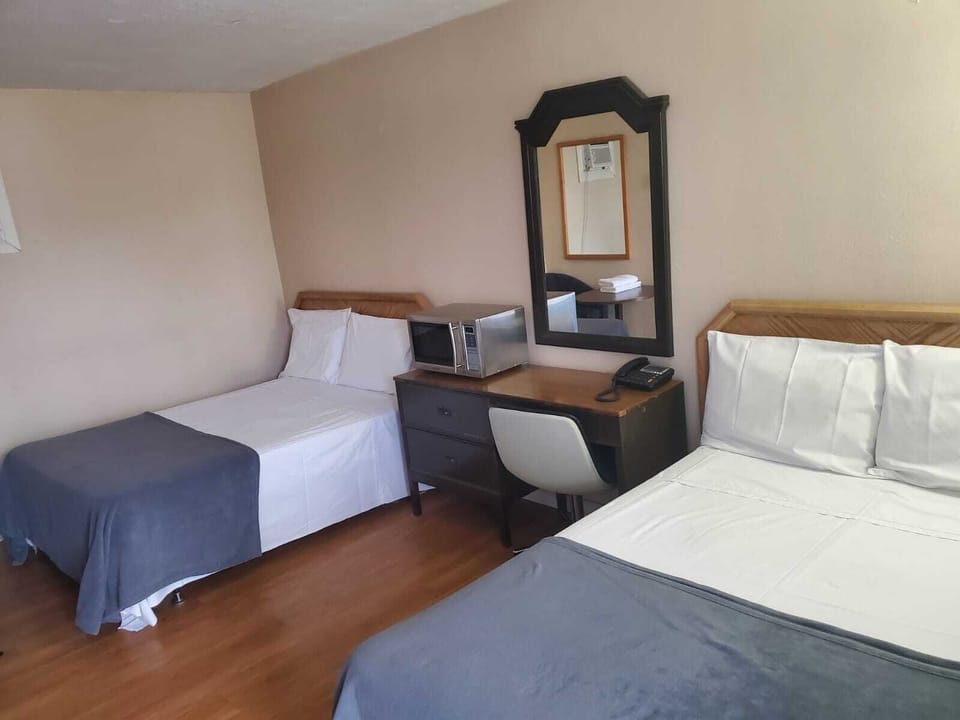 Blackout drapes, free WiFi, bed sheets