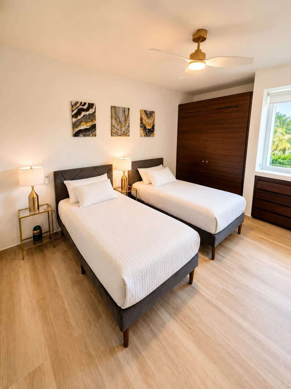 Bright bedroom with cozy bedding, natural light, and a peaceful atmosphere.