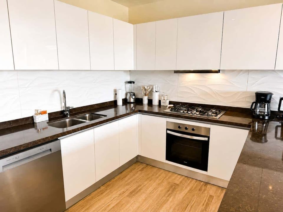 Equipped kitchen with everything needed for easy meals during your stay.