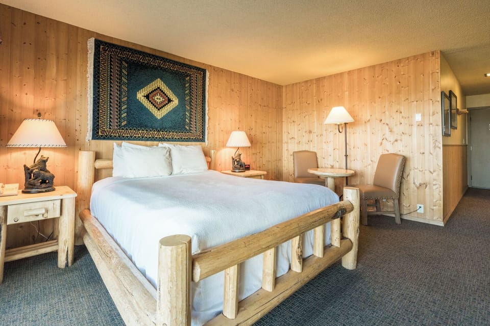 Stretch out in a warm, wood-paneled room made for rest.