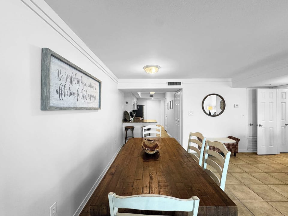Share meals, laughter, and beach stories around this welcoming dining table
