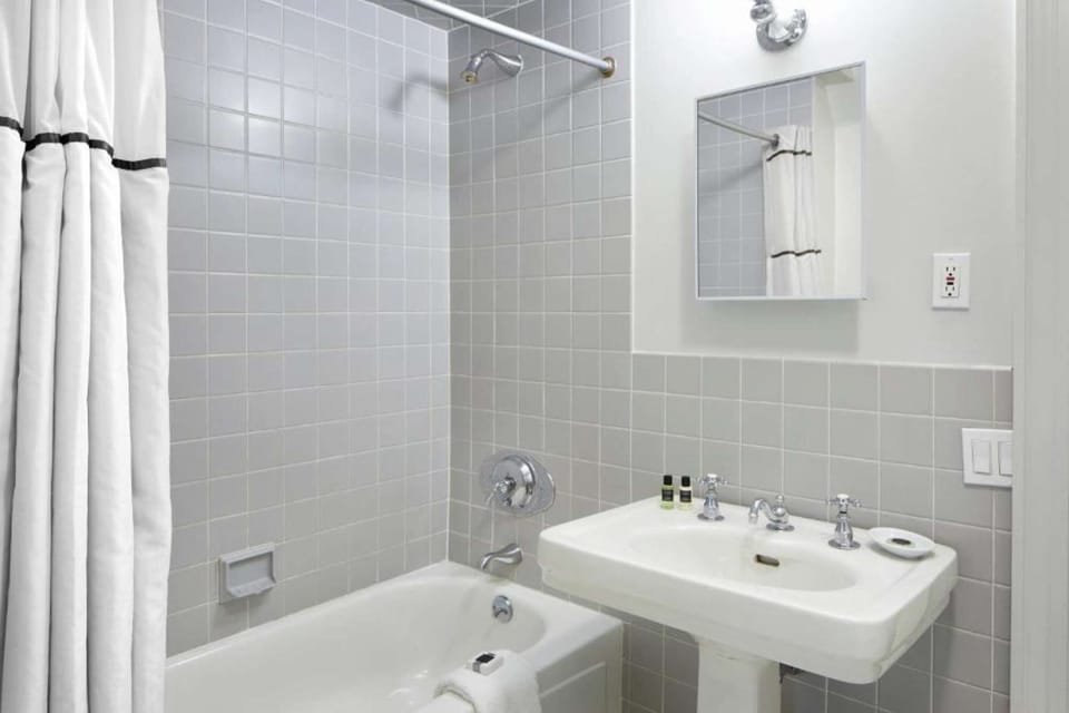 Bathroom with shower/tub combination.
