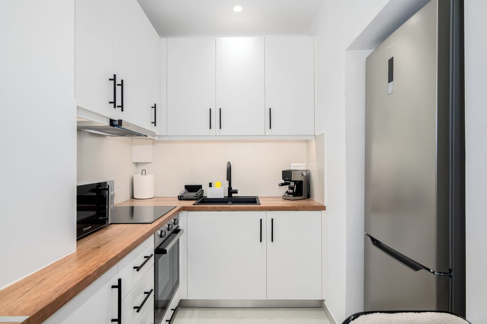 Luxury Apartment, Balcony | Private kitchen | Full-size fridge, microwave, oven, stovetop