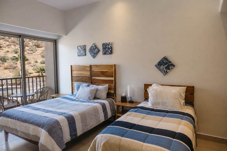 Bedroom 2 Queen and Twin Beds