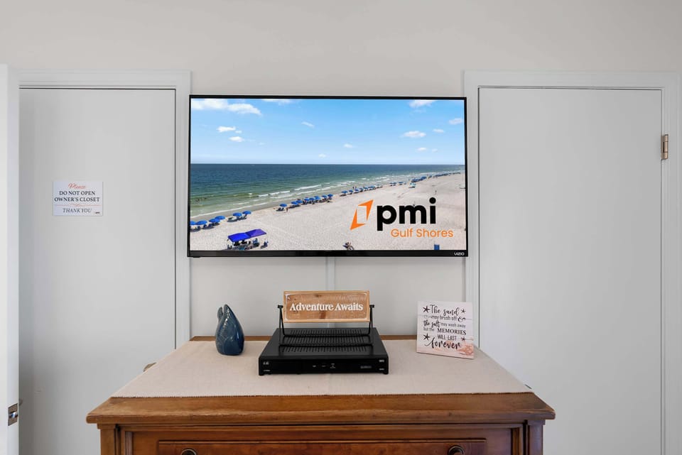 Peaceful king bedroom with coastal decor, smart TV and cable TV