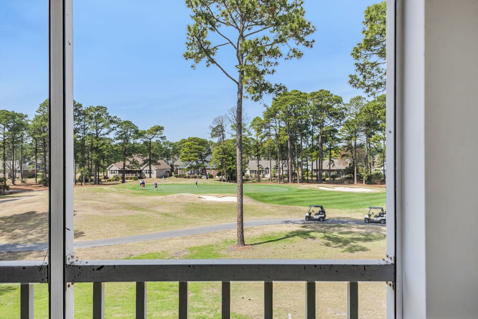 View of the 16th hole of the Byrd Course from living room and screened porch