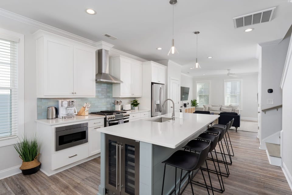Oversized island offers plenty of prep space and seating.