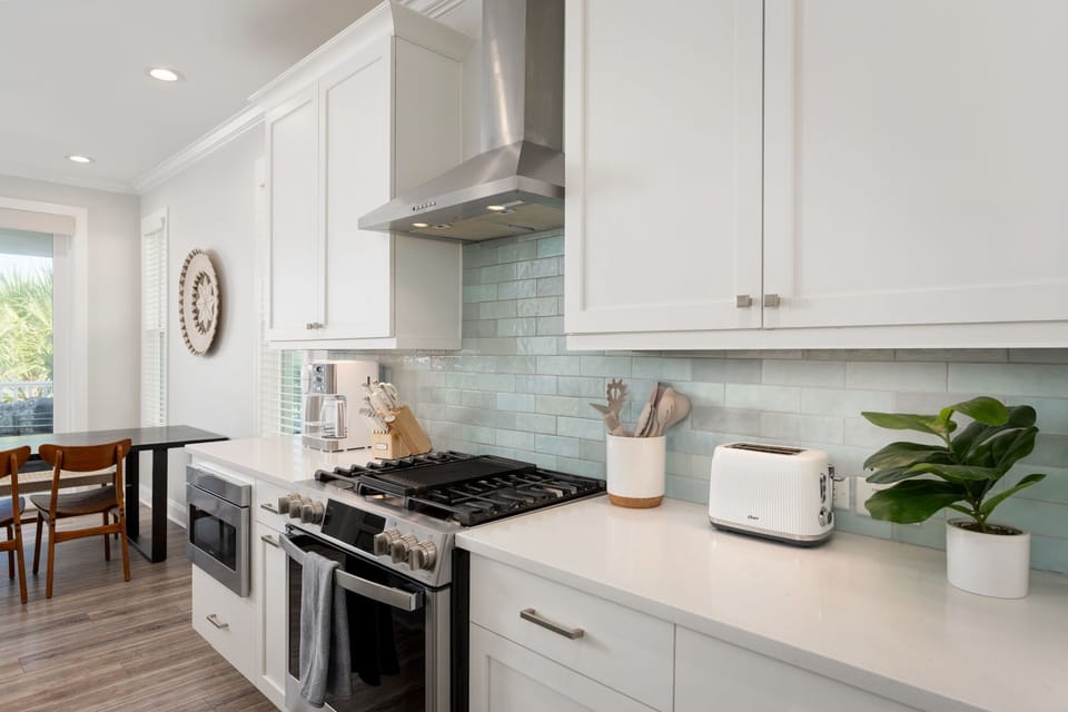 Plenty of space for multiple cooks to work comfortably together. Fully stocked, gas range for family meals.