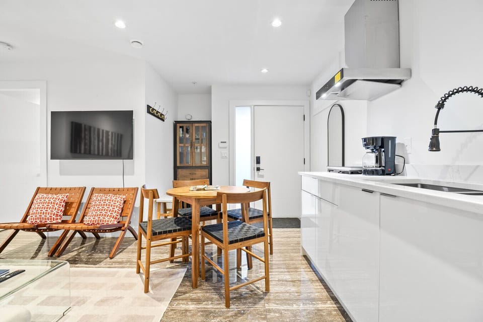 Kitchen & Dining: Modern space with sleek appliances and intimate seating for memorable meals!