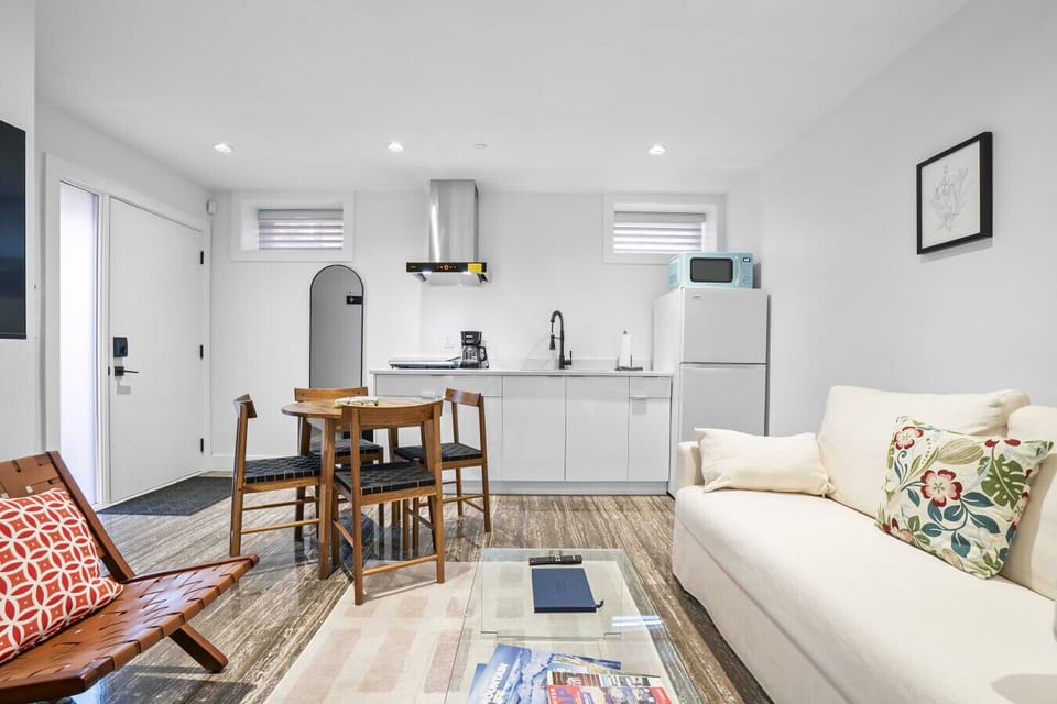 Chic Kitchenette Suite: Bright, modern space with stylish furnishings and dining perfect for your getaway!