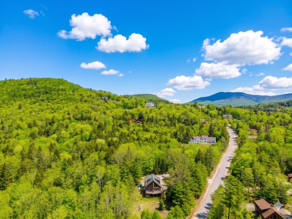 Surrounded by rolling hills and lush forests, the cabin offers a tranquil escape in nature.