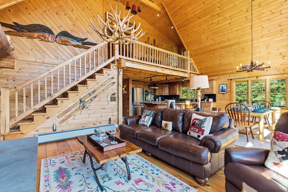 Spacious and inviting, this grand lodge-style living area is perfect for groups and family gatherings.