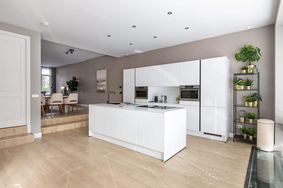 Fully equipped modern kitchen with island and everything needed for cooking at home