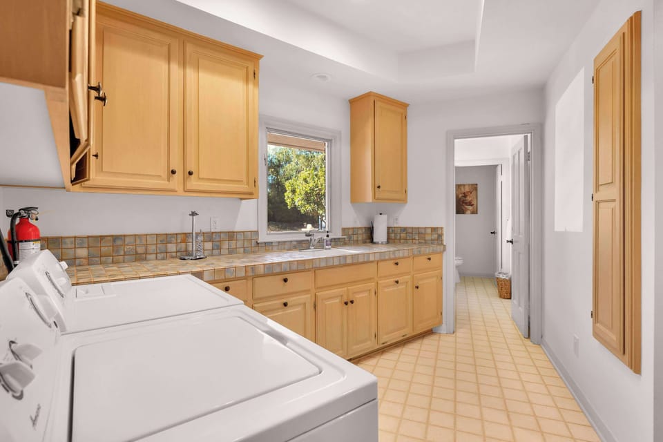 Spacious laundry room for added convenience ✨