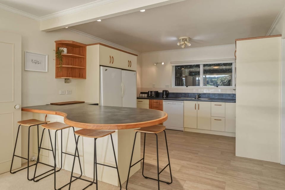 Kitchen island with bar stools
