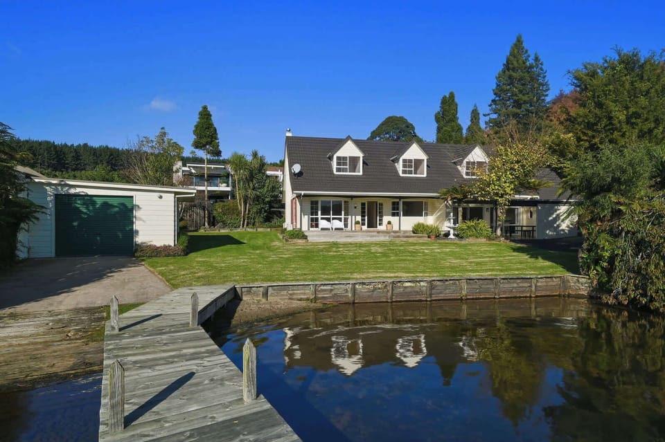 Home and pond at golden hour