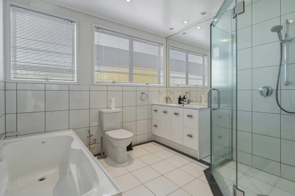 Bath and shower in main bathroom (upstairs)