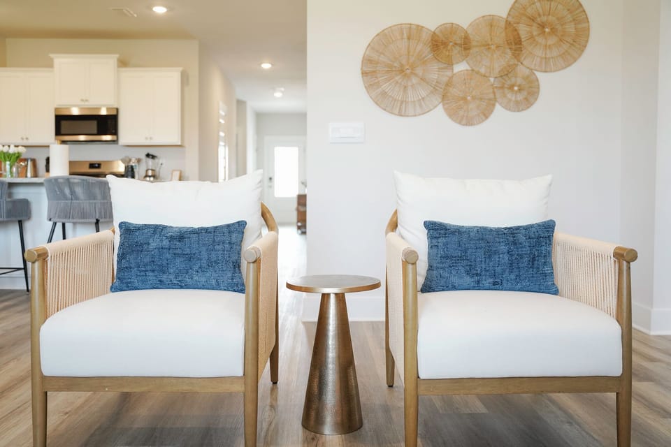 Relax in a sun-filled living room with cozy seating