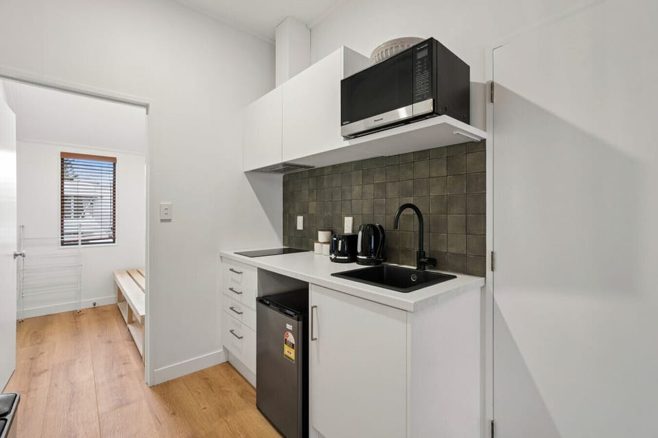 Kitchenette: Enjoy modern amenities and sleek design for your culinary adventures!