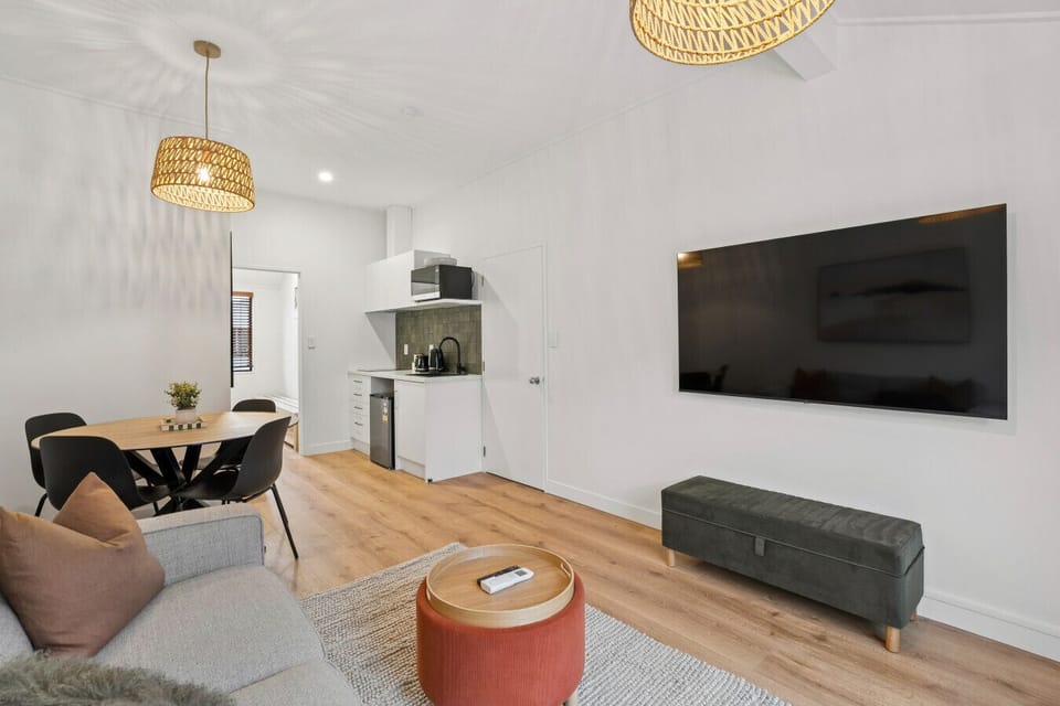 Living Room: Bright space with modern decor, perfect for relaxation and entertainment!