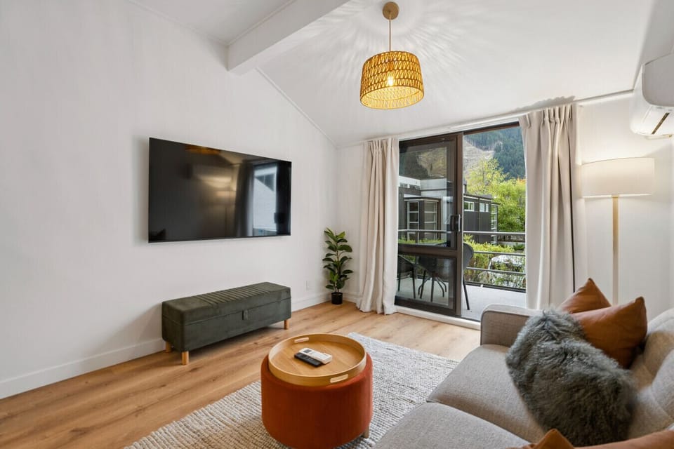 Living Room: Bright and airy with mountain views, perfect for relaxing and unwinding!