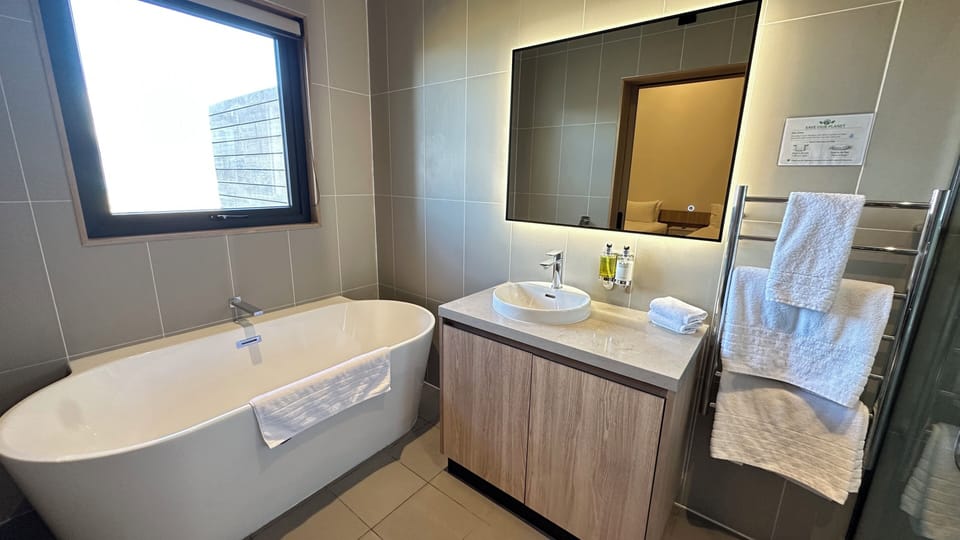 Separate tub and shower, free toiletries, hair dryer, towels