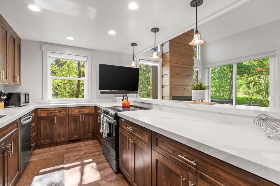 Spacious open kitchen area with a fully stocked supply of cooking items
