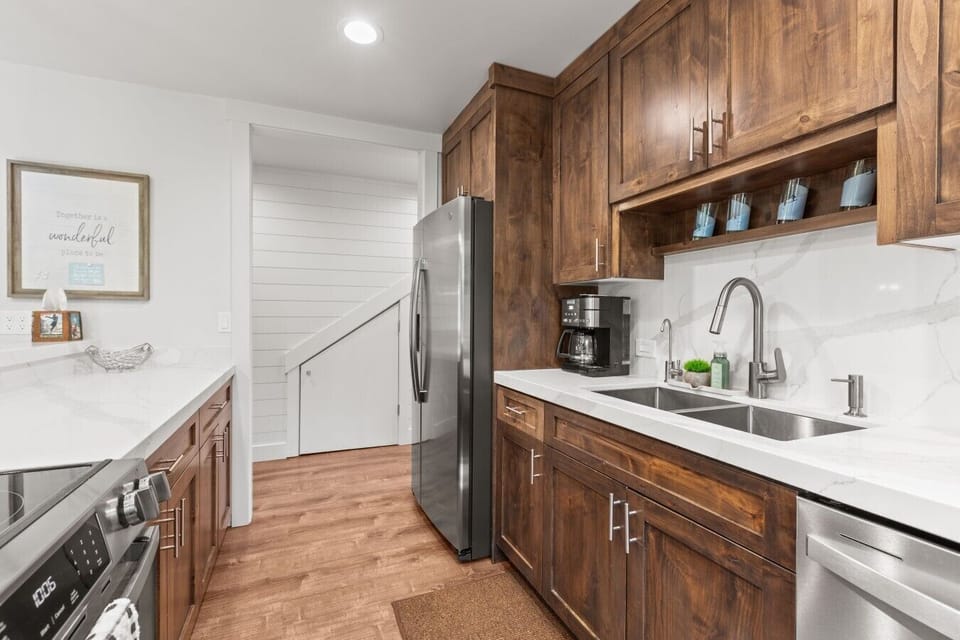 Spacious open kitchen area with a fully stocked supply of cooking items