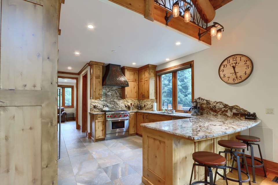 Kitchen bar area with seating for 3