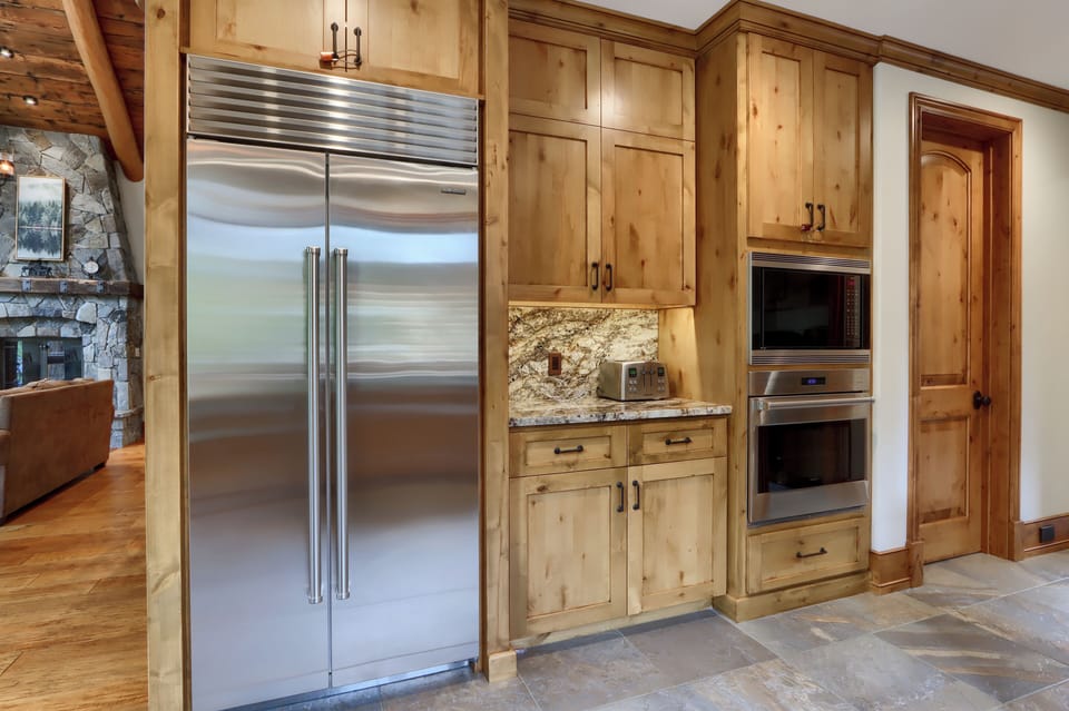 Kitchen with a Sub-Zero refrigerator and a Wolf range and Dual Ovens