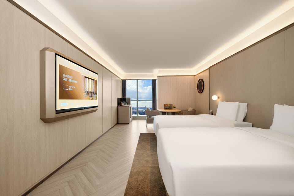 Standard Twin Room, Lake View | Down comforters, minibar (free items), laptop workspace, blackout drapes