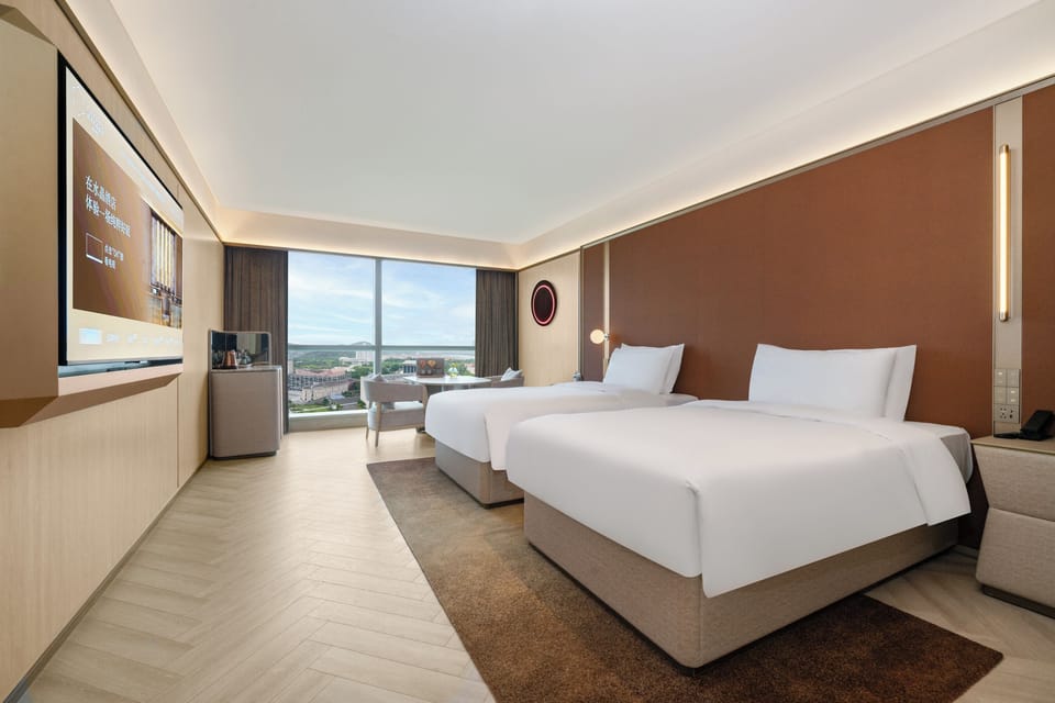 Standard Twin Room, Lake View | Down comforters, free minibar, laptop workspace, blackout drapes