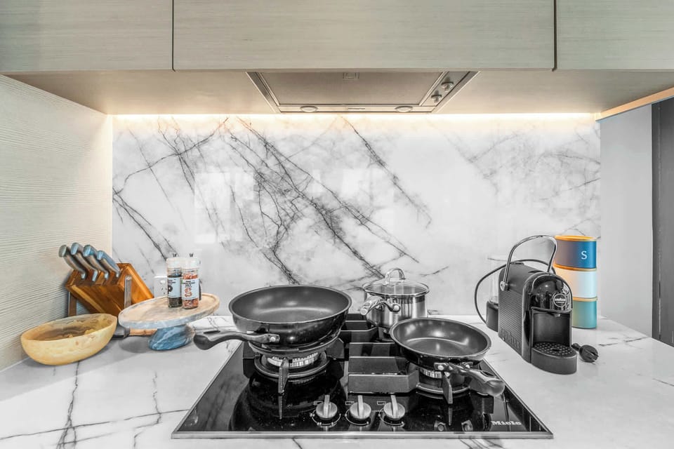 Premium kitchen with integrated fridge, generous storage and everything needed for an easy stay.