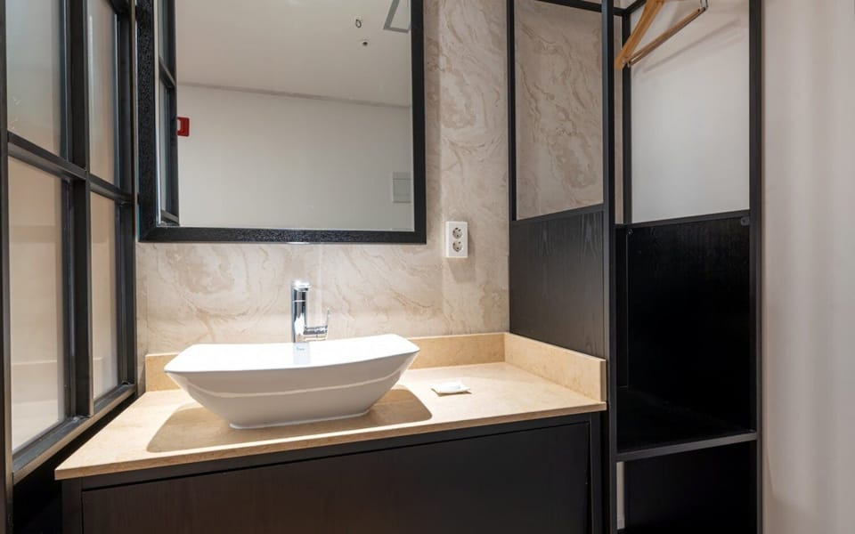 Ondol Room (Korean Style) | Bathroom | Hair dryer, towels, shampoo, toilet paper