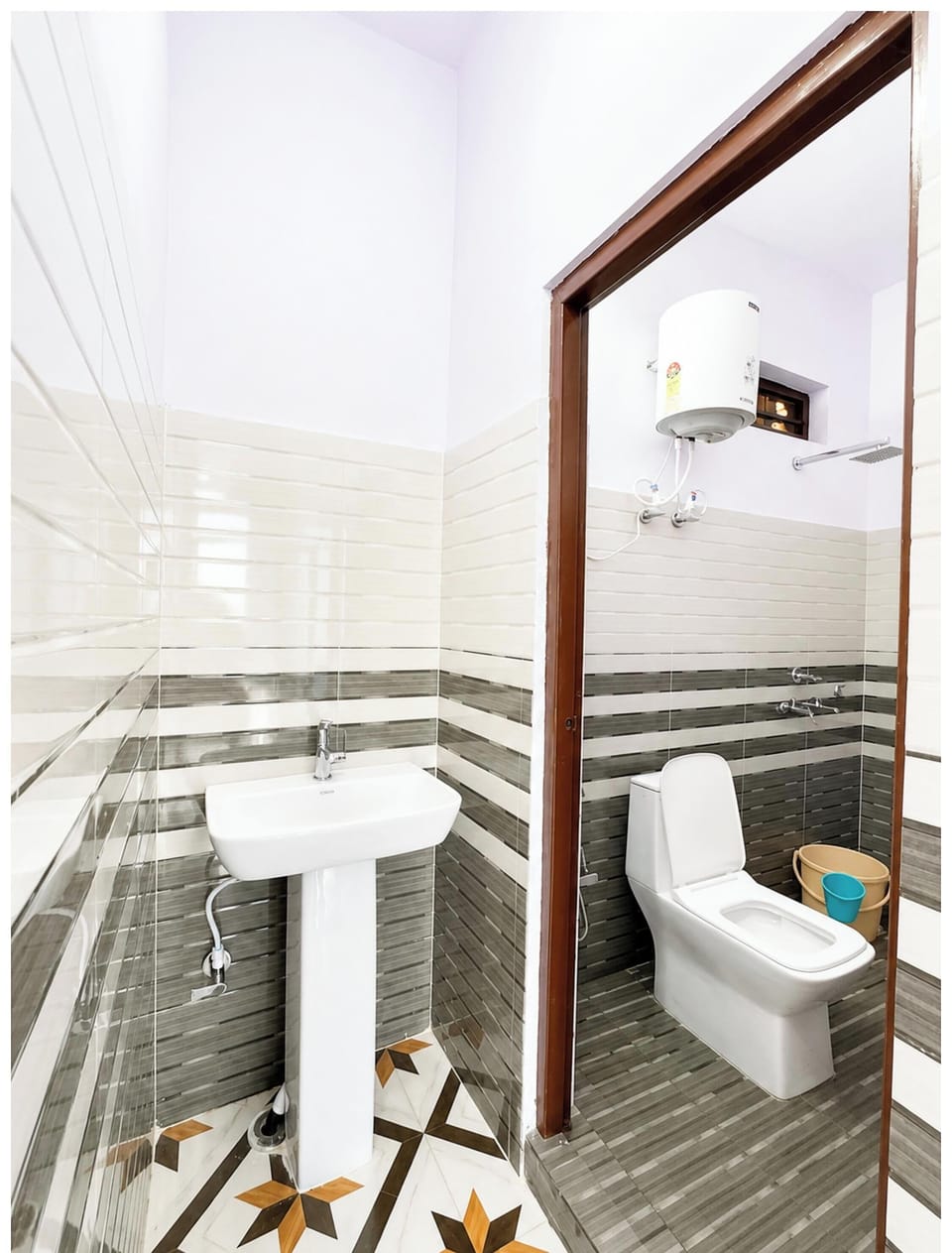 Shower, rainfall showerhead, slippers, towels