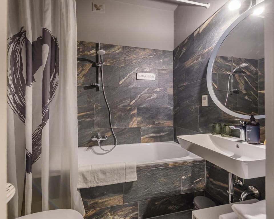 Hair dryer, towels, soap, shampoo