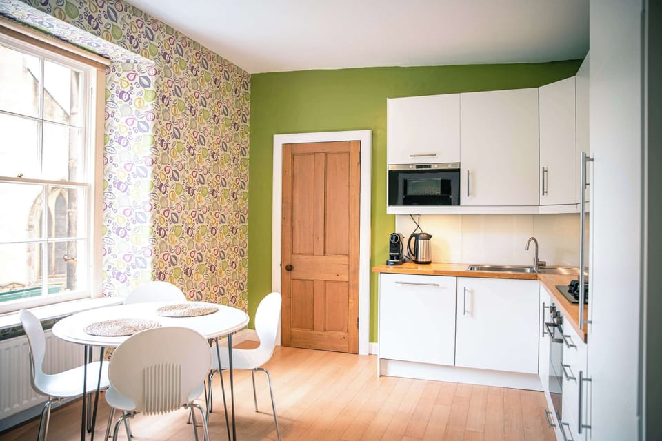 Bright dining nook beside the kitchen, perfect for slow breakfasts & coffee mornings