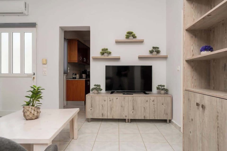 Contemporary living space with smart TV and natural light