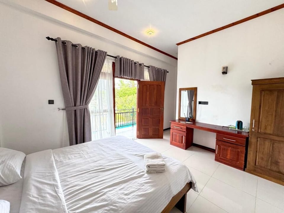 Deluxe Double Room, Balcony, Pool View | Laptop workspace, free WiFi